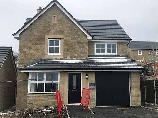 Builder Chesterfield - detached home still having work done on garden and driveway