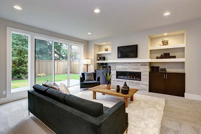 Future-Proof with Adaptable Spaces with open plan modern living room in custom built home